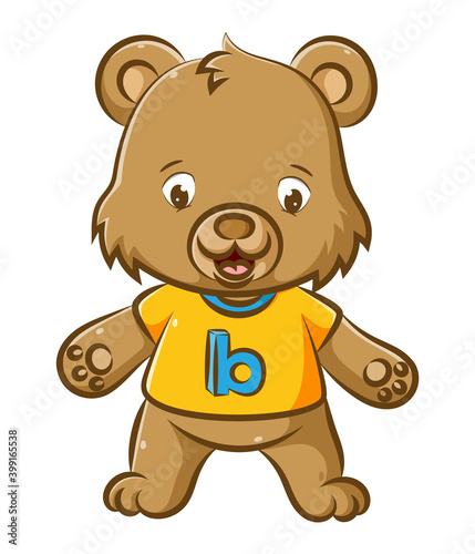 The little baby bear with the yellow shirt and the B alphabet is standing