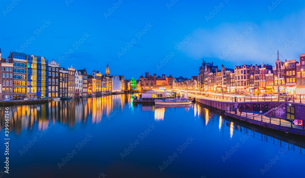 Evening panorama of Amsterdam. Dutch architecture 