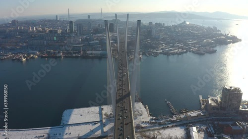 Winter Golden Bridge in Vladivostok filmed from drone. 