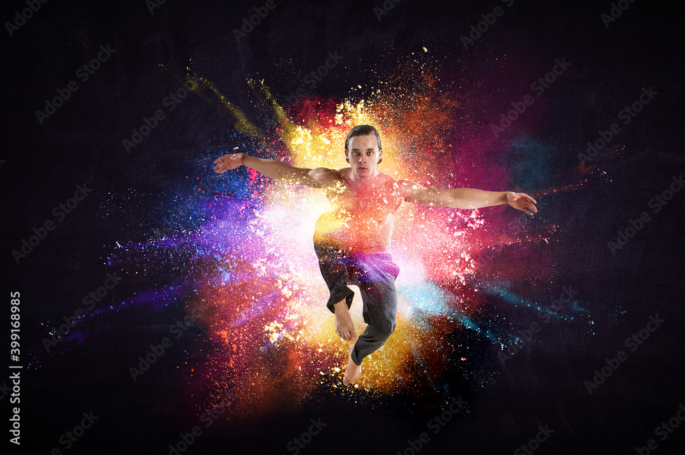 Male dancer against colourful background