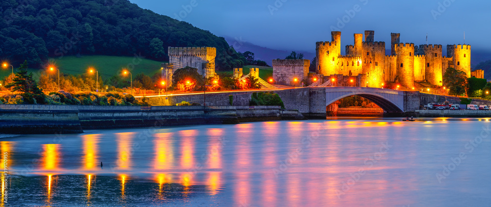 Conwy Castle at dusk located in Conwy. North Wales, UK