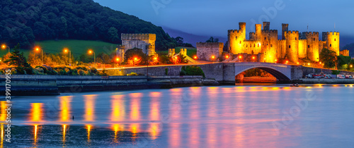 Conwy Castle at dusk located in Conwy. North Wales, UK