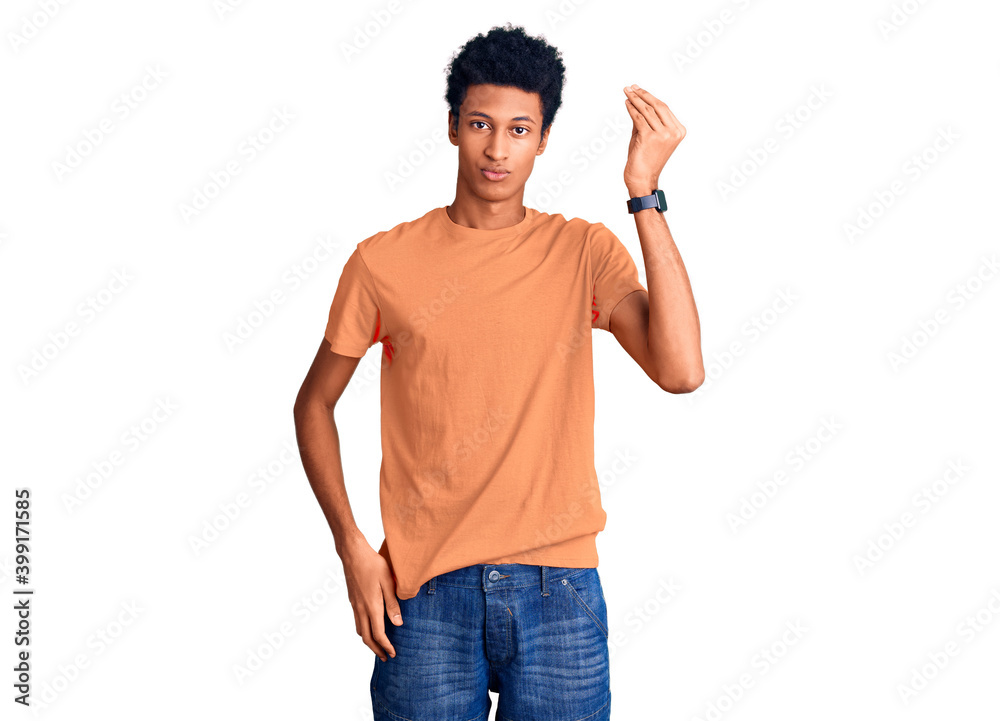 Young african american man wearing casual clothes doing italian gesture with hand and fingers confident expression Young african american man wearing casual clothes doing italian gesture with hand and fingers confident expression