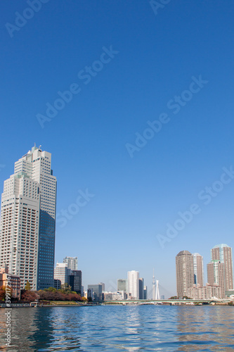 High-rise buildings against blue sky in Tokyo © Yz-Wu