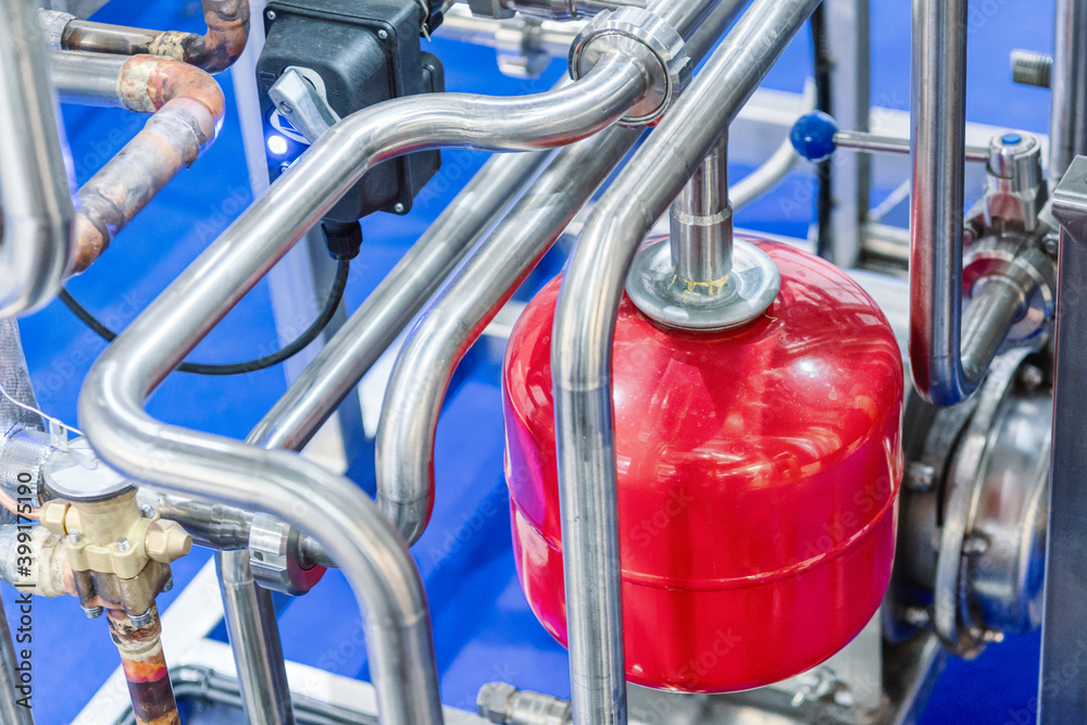 Large stainless pipes and steel cylinders. Large stainless pipes and steel cylinders.