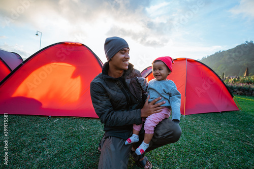 Portrait happy of the campground family with beautiful hill views