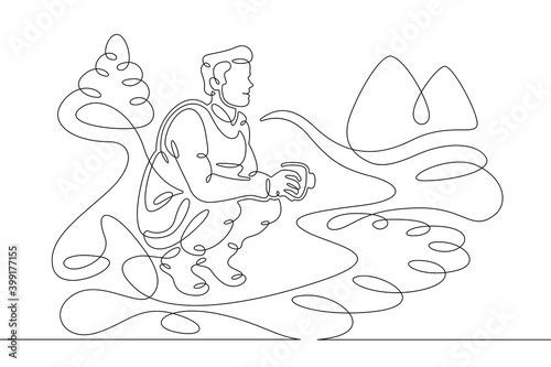 Young male tourist fisherman drinks coffee on the bank of a mountain river. Mountain landscape.One line continuous thick bold single drawn art doodle isolated hand drawn outline logo illustration.
