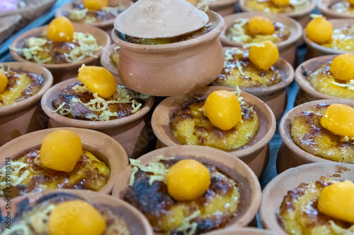 Thai dessert in small clay pots or bowls