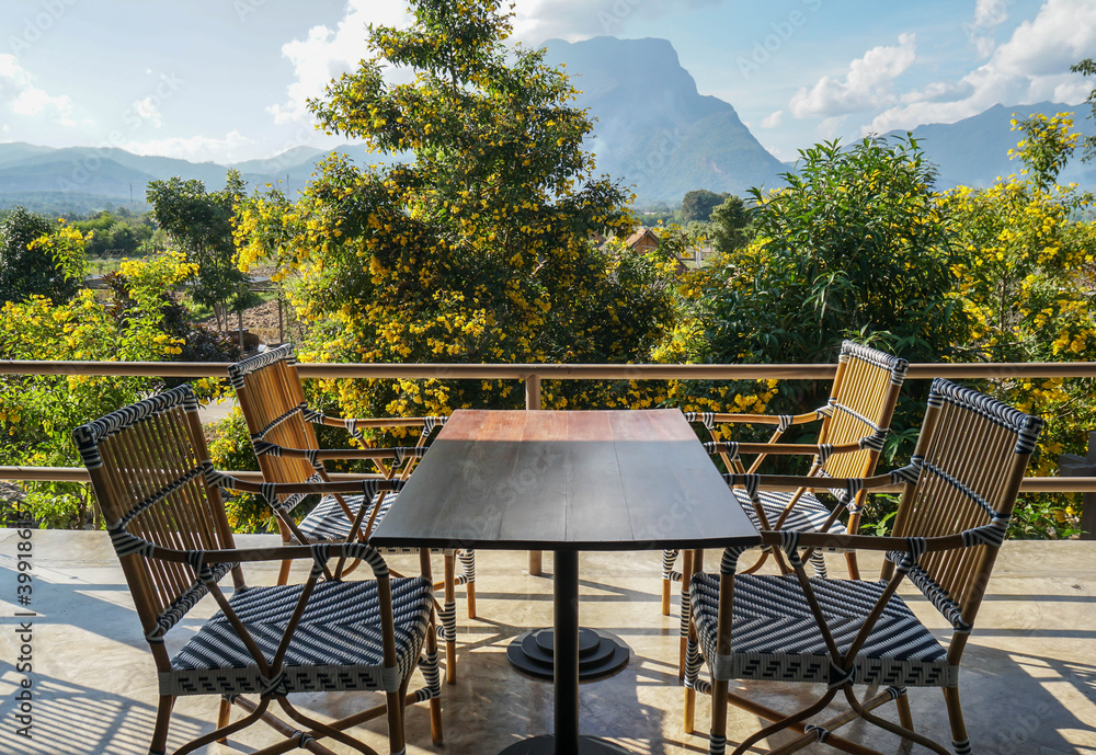 Fototapeta premium dining table and chair set in outdoor restaurant for lunch and dinner