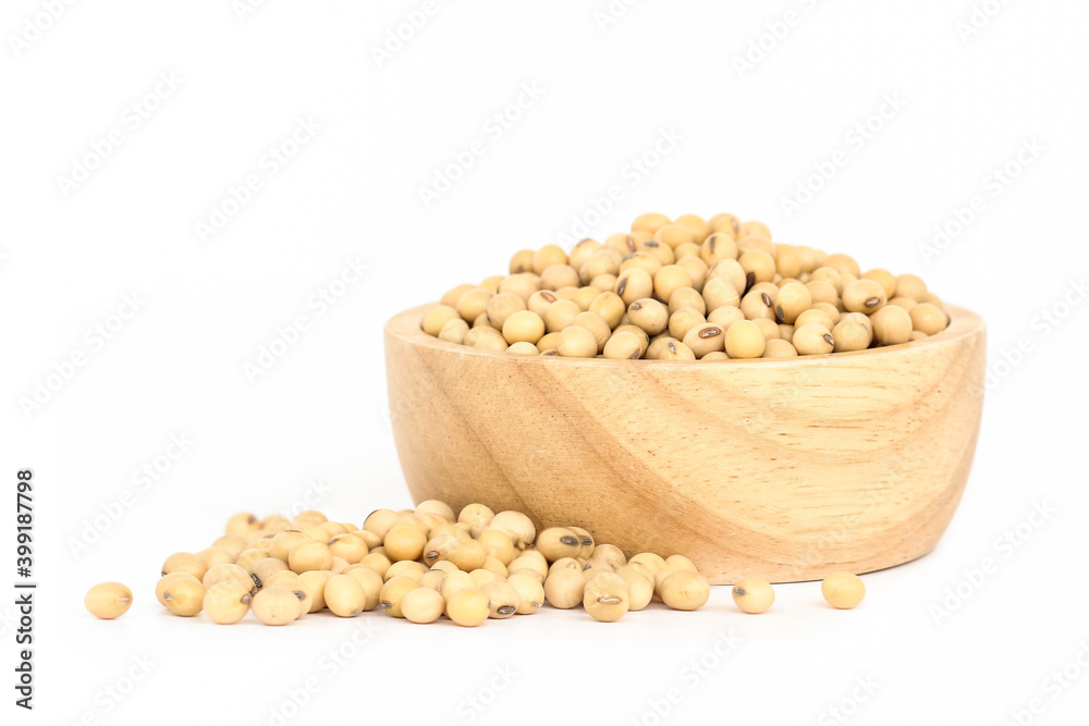 Soybean in wooden bowl isolated on white background. Soybean in wooden bowl isolated on white background.