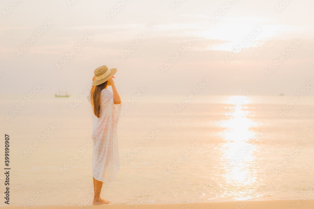 Portrait beautiful young asian woman relax smile leisure around outdoor sea beach ocean at sunset time Portrait beautiful young asian woman relax smile leisure around outdoor sea beach ocean at sunset time