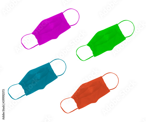 four colored masks over a white background