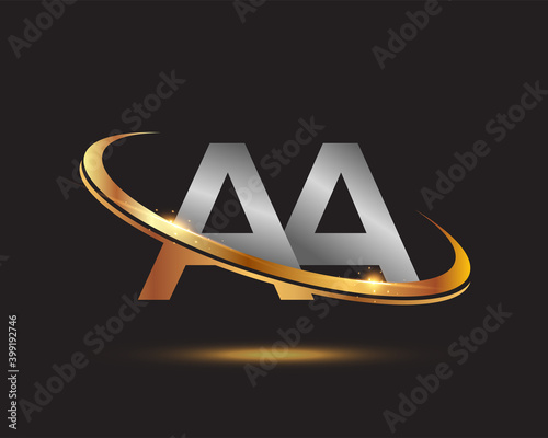 initial letter AA logotype company name colored gold and silver swoosh design. isolated on black background.