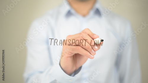 Transport Law, man writing on transparent screen