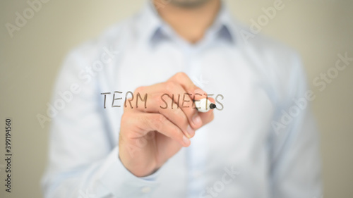 Term Sheets , man writing on transparent screen