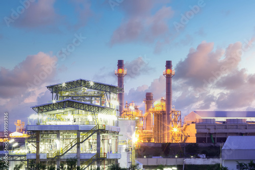 Power plant, gas fired power station. Industrial factory may called combined cycle gas turbine plant or CCGT. Electricity energy generation by natural gas, heat recovery steam generator and boiler. photo