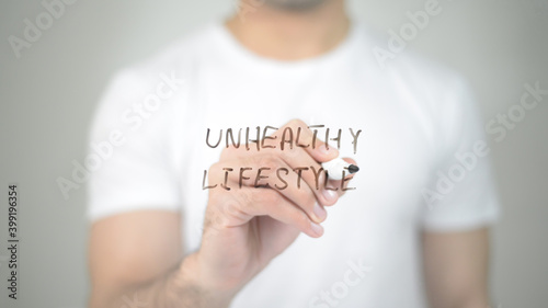 Unhealthy Lifestyle, man writing on transparent screen
