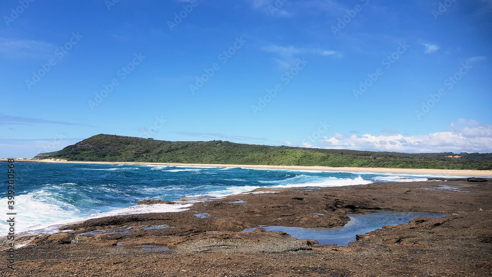 The Rock Platform at Moonee Beach Near Catherine Hill Bay New South Wales Australia, with Ocean Waves crashing over the rocks
