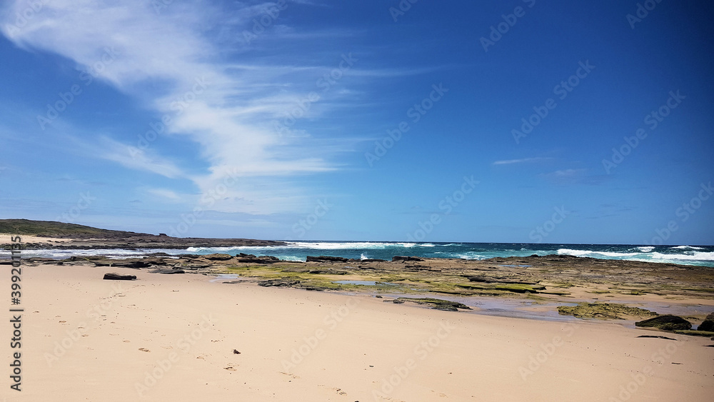 Moonee Beach Near Catherine Hill Bay New South Wales Australia, with Ocean Waves crashing over the rocks Moonee Beach Near Catherine Hill Bay New South Wales Australia, with Ocean Waves crashing over the rocks