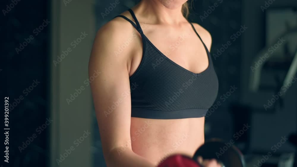 close up woman hand is exercising with dumbbells at the gym, concept of healthy lifestyle, sports, training, wellness, and sport close up woman hand is exercising with dumbbells at the gym, concept of healthy lifestyle, sports, training, wellness, and sport