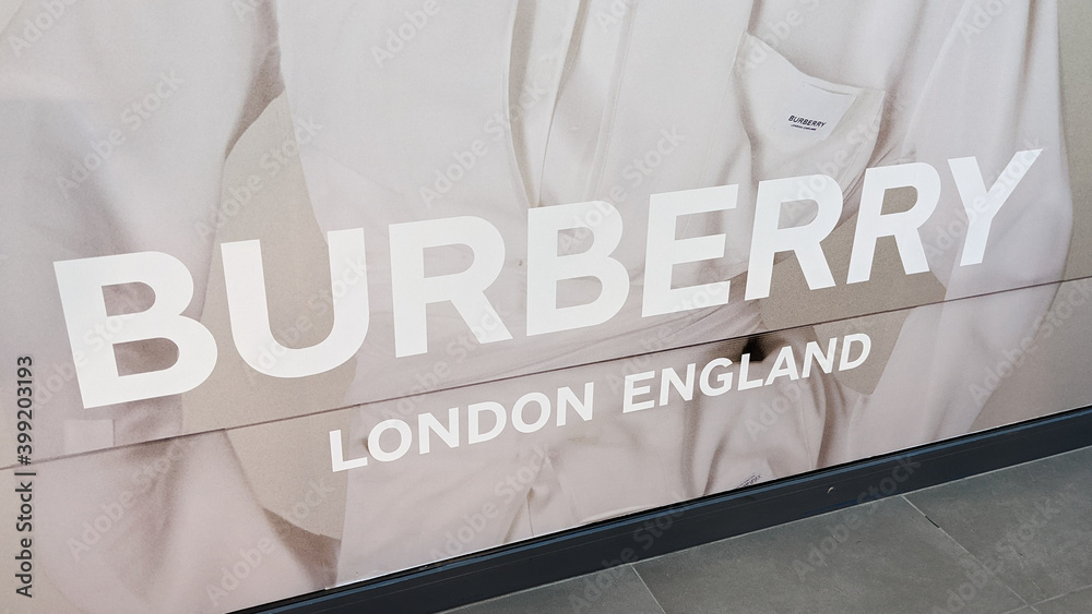 Burberry Store london england leading entrance logo and sign text front of  store fashion brand clothes shop in street Stock Photo | Adobe Stock