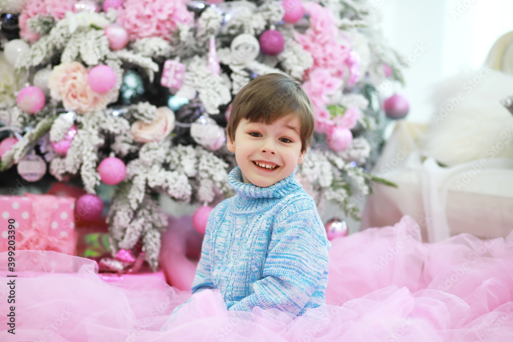 Family decorating beautiful live Christmas tree. Loving family with presents in room. Happy family on holidays. Family decorating beautiful live Christmas tree. Loving family with presents in room. Happy family on holidays.