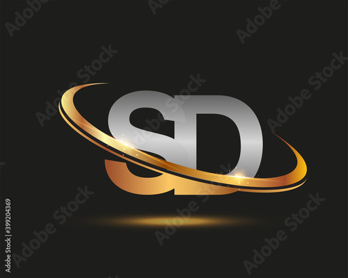 initial letter SD logotype company name colored gold and silver swoosh design. isolated on black background.