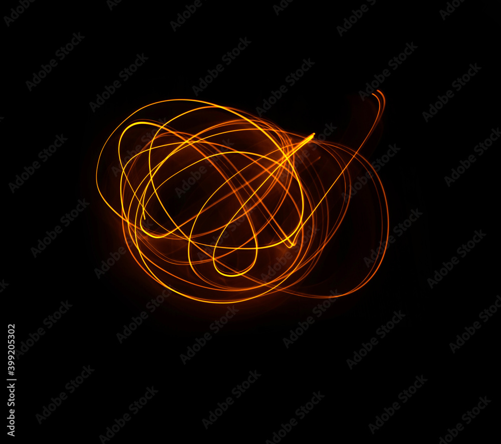 Light wave trail path, vibrant neon gold color in abstract swirls on a black background