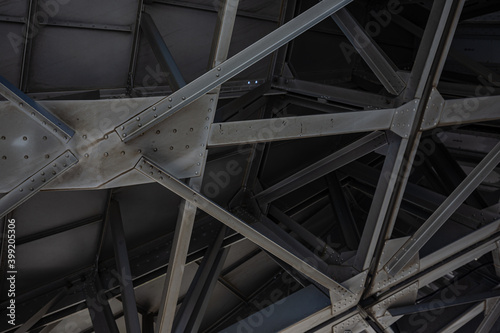 Rusty metal grilles, painted with silver paint, industrial premises, bolt screwed into the roof slab frame, radio signal dish