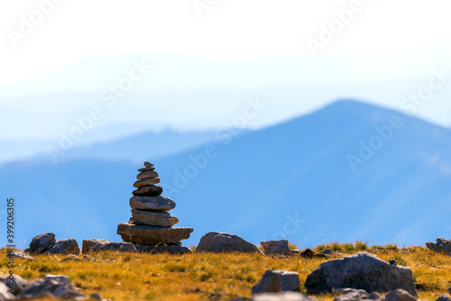 Zen balanced stones stack in high mountains. Scenic mountain view.