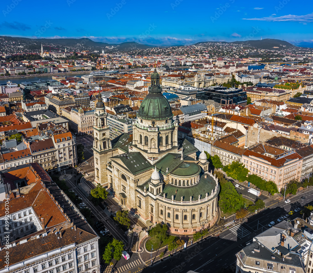 Budapest, Hungary - Aerial view of St.Stephen's Basilica on a sunny summer day with clear blue sky. Fisherman's Bastion, Matthias Church and Parliament building at background