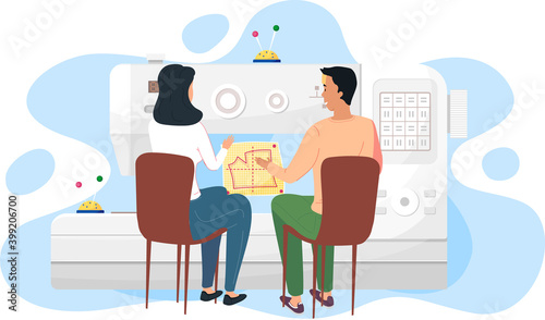 People work with a big sewing machine. Designers are planning future garment. Couple communicates while working. Guy with girl spending time in the fashion studio. Pattern of clothing on background