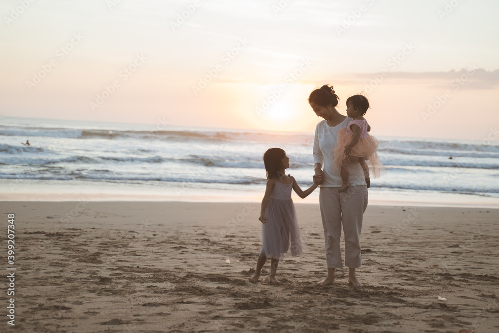 Portrait family enjoying a vacation on the beach