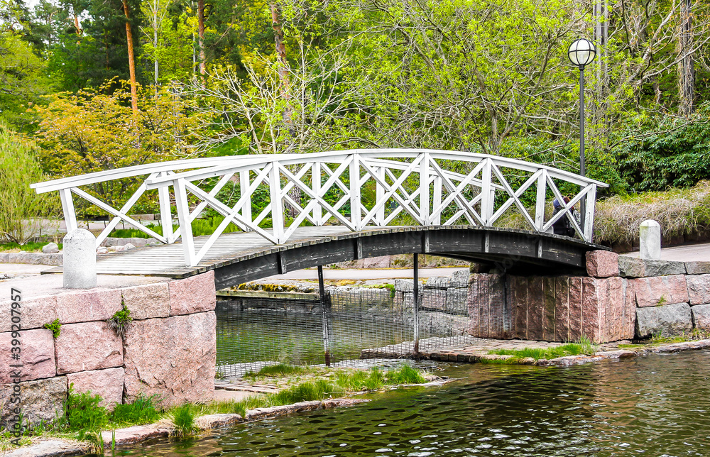 White bridge in Sapokka Water Garden in Kotka, Finland.