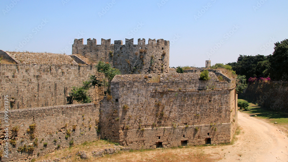 Rhodes fortifications, fortress wall with a carved coat of arms, medieval fortress, the old town of Rhodes, Greece