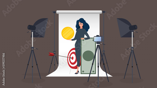 Business Coach writes a vlog. The girl is holding a gold coin in her hands. Camera, softbox, studio. Online learning concept. Vector.