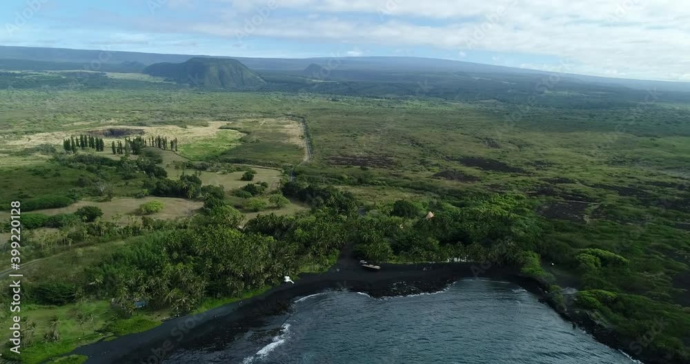 4k hovering descending aerial view of Punaluu beach,The beach has black sand made of basalt and created by lava flowing into the ocean which explodes as it reaches the ocean and cools,Big Island,Hawai 4k hovering descending aerial view of Punaluu beach,The beach has black sand made of basalt and created by lava flowing into the ocean which explodes as it reaches the ocean and cools,Big Island,Hawai