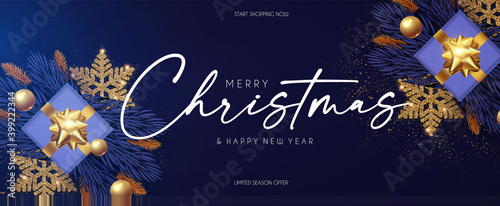 Merry Christmas design template with fir tree branch garland, glossy golden balls, elegant gold snowflakes