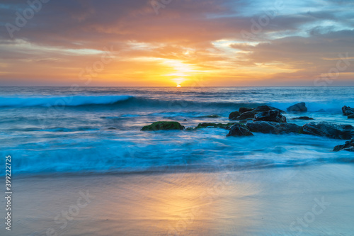 High cloud beautiful sunrise seascape © Merrillie