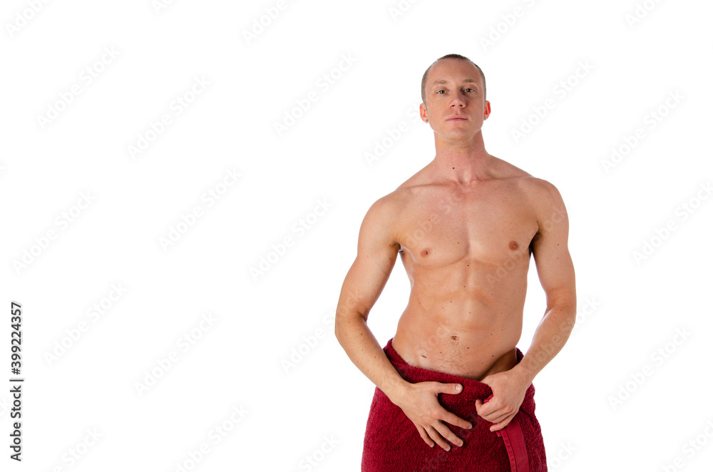 Fototapeta premium Fashion portrait of strong brutal guy with a modern trendy hairstyle. Sexy torso. Male flexing his muscles. Sport workout bodybuilding.