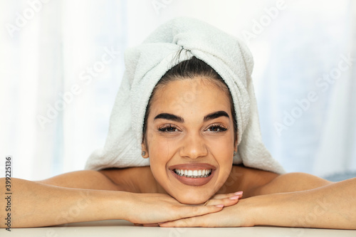 Beautiful young woman with clean fresh skin on face. Girl facial treatment . Cosmetology, beauty and spa. Pretty woman clean fresh skin. Skin care. 