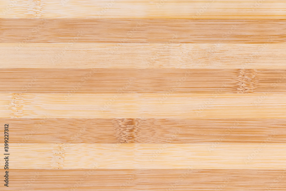Board made of the glued bamboo wood pieces, background, texture Board made of the glued bamboo wood pieces, background, texture