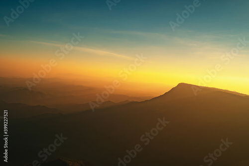 panorama landscape nature mountain with sunset and blue sky background