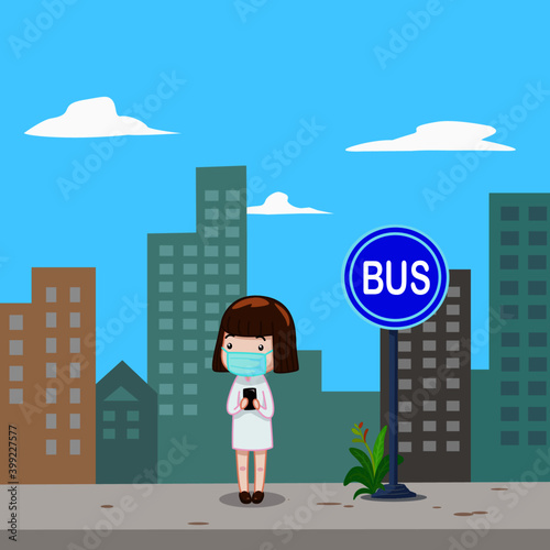 Young woman stand alone at the bus stop in city