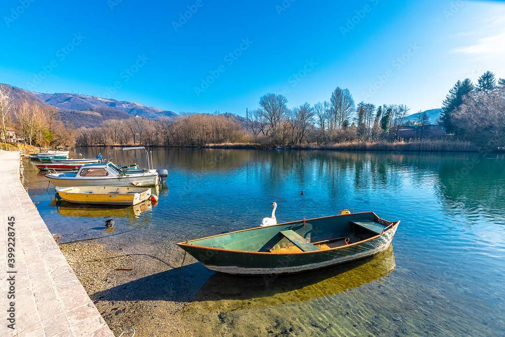 Fishing boats on Adda River in Brivio Town of Italy