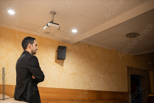 man giving conference or press conference