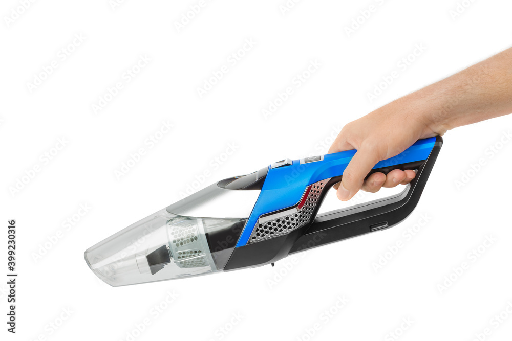 Fotografie Cordless vacuum cleaner in hand