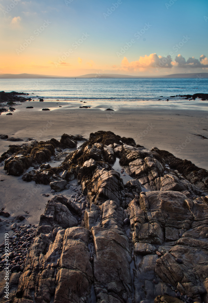 Beautiful morning orange sunrise at Salthill beach in Galway city, Ireland Beautiful morning orange sunrise at Salthill beach in Galway city, Ireland