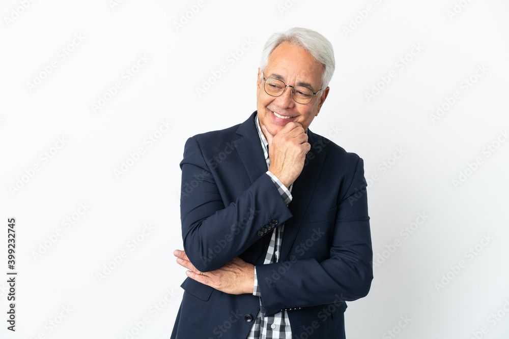 Middle age Brazilian man isolated on white background looking to the side and smiling Middle age Brazilian man isolated on white background looking to the side and smiling