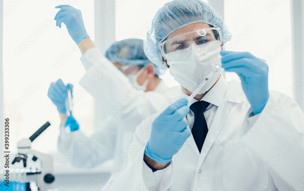 background image of a laboratory assistant in a medical laboratory background image of a laboratory assistant in a medical laboratory